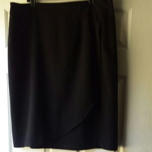 Kim Rogers,  black skirt.